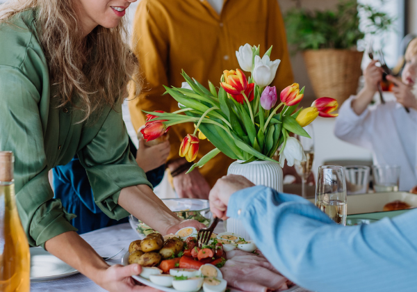 family gathered around a table for Easter recipes and wine pairing